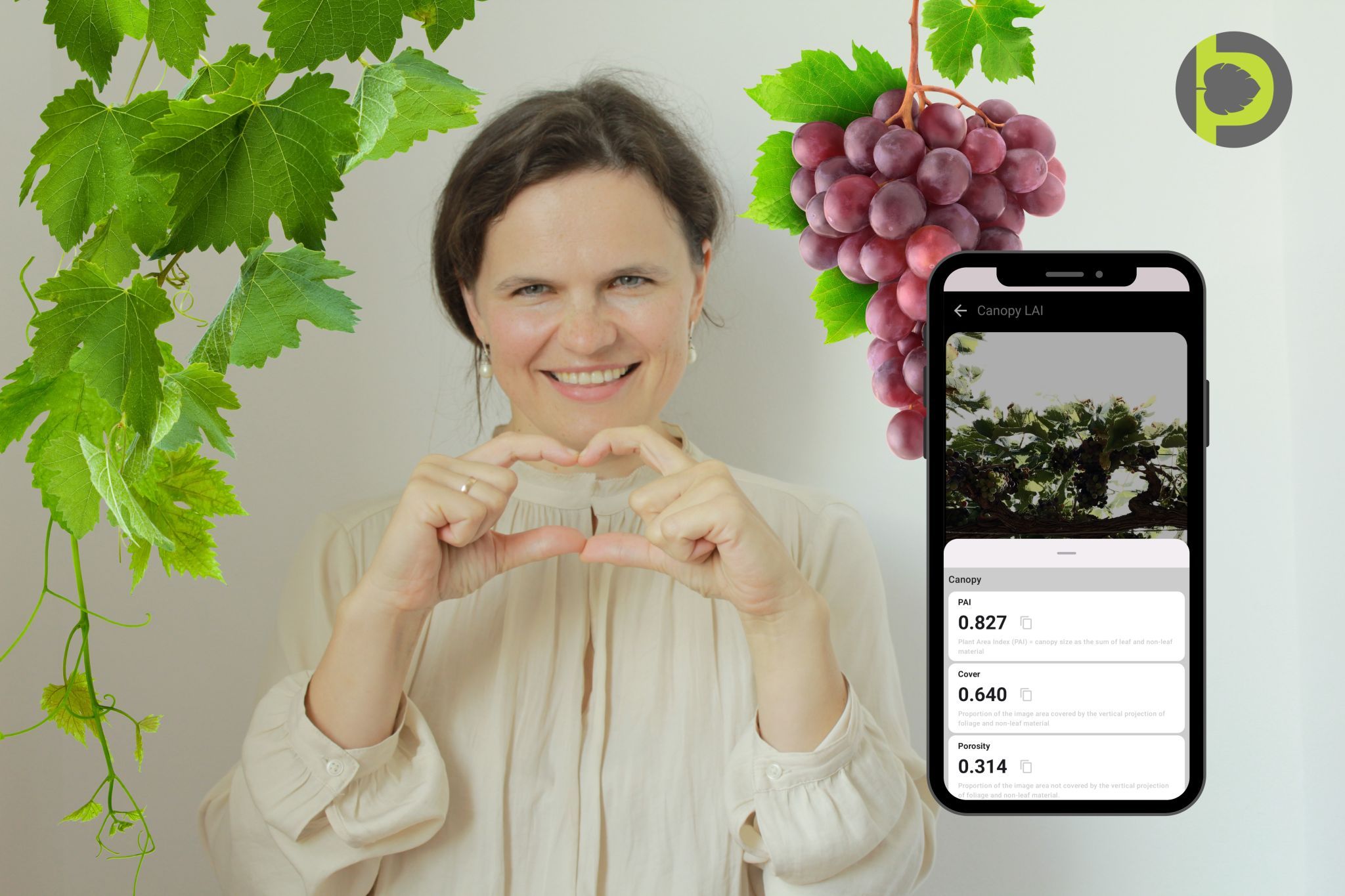 Petiole Pro founder Dr Maryna Kuzmenko beside grapevine leaves and grapes, holding a phone showing grapevine Canopy LAI results — PAI 0.827, Cover 0.640, Porosity 0.314.